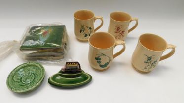 A collection of Wade items to include four Cranky tankards and two pin dishes along with a