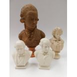 A collection of four busts of composers, two Parian ware depicted as Derby and Granville, a larger