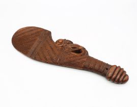 A late 20th century New Zealand Maori carved "Wahaika" hand club, approx 36cm long