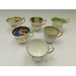 Six 18th and 19th century English porcelain tea and coffee cups, including Derby, Alcock, Daniel and