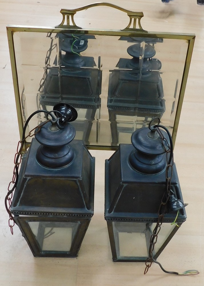 A pair of 20th century hanging lanterns with four glazed sides each and pendant and chain hangers to