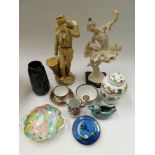 A collection of miscellaneous ceramics: an amphora figurine of a young man, a Giuseppe Armani