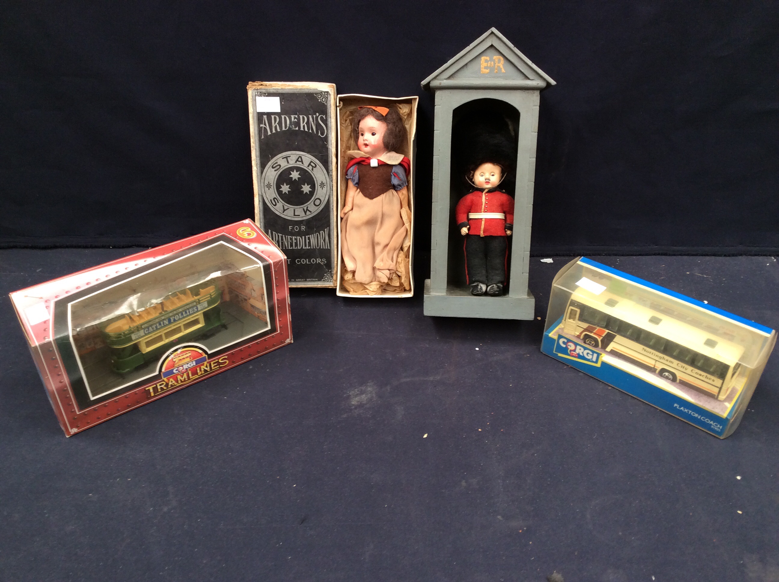 Corgi, Plaxton coach with Corgi tram, in boxes along with a Royal tourist doll in guard box and a