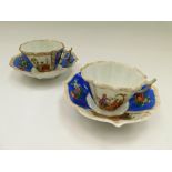 Two Dresden tea cups and saucers with two blue panels with floral sprays and two panels with