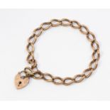 A 9ct rose gold curb bracelet, width approx 7mm, padlock clasp, length approx 19cm, weight approx