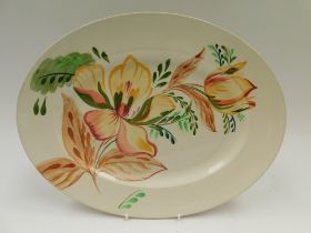 A Clarice Cliff oval platter , Hand painted underglaze floral design ,Royal Staffordshire