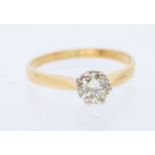 A diamond and 18ct gold solitaire ring, comprising a round brilliant cut diamond, approx diamond