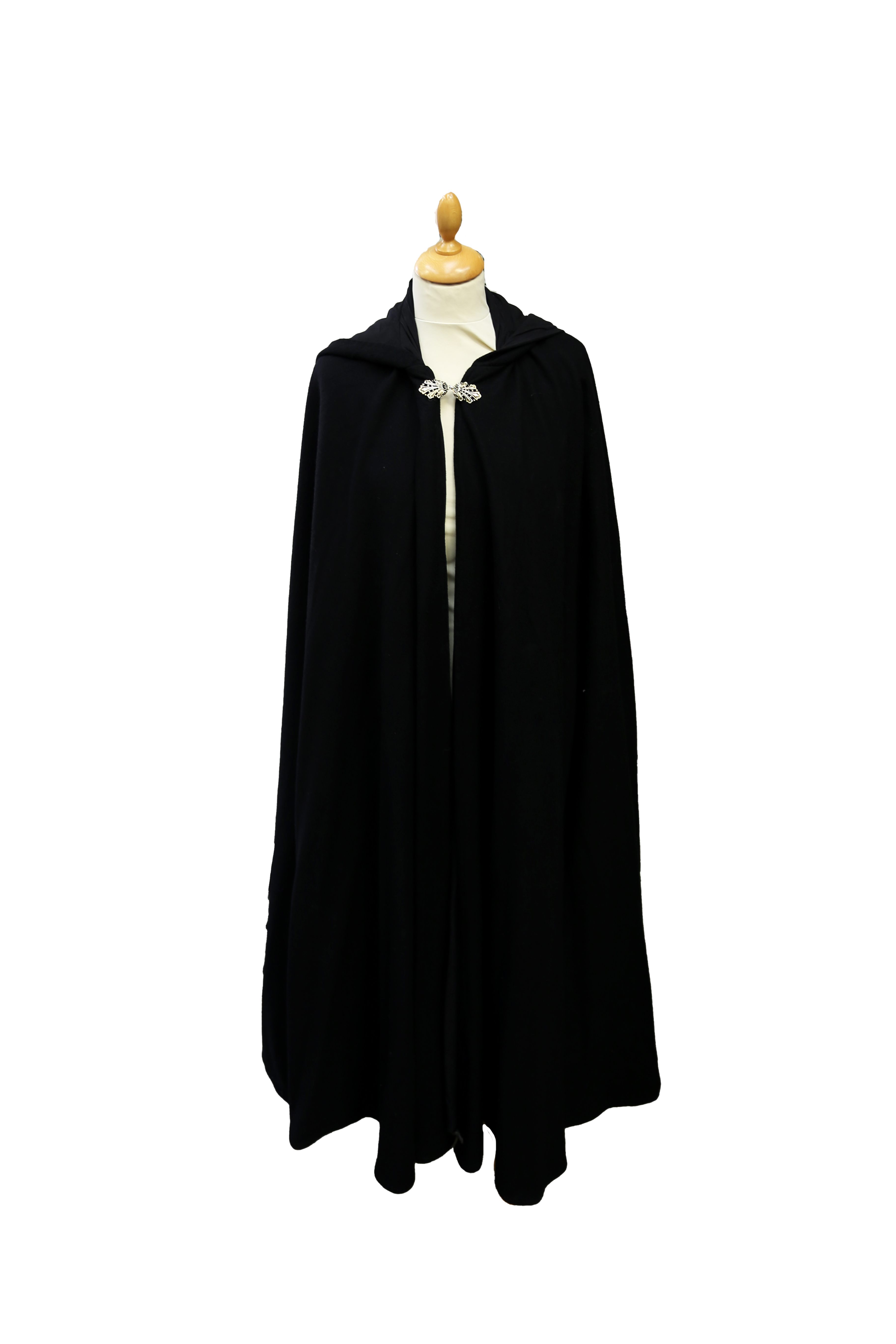 A black wool opera cape with brass leaf motif fastening, with a hood.