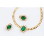 Christian Dior- a vintage paste set 'emerald' gilt metal necklace along with a matching pair of clip
