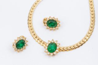 Christian Dior- a vintage paste set 'emerald' gilt metal necklace along with a matching pair of clip