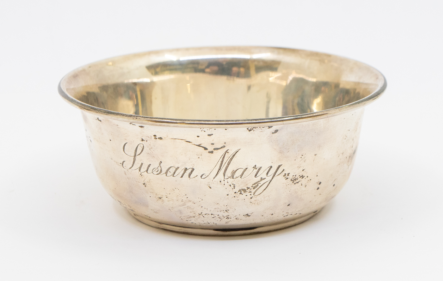 An early to mid 20th century circular silver bowl, plain design, engraved "Susan Mary", hallmarked