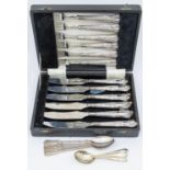 A cased set of Elizabeth II silver handled dessert knives and forks, superior quality stainless