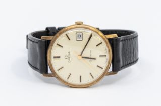 Omega- a gents 9ct gold Omega Genéve wristwatch, comprising a signed champagne dial with applied