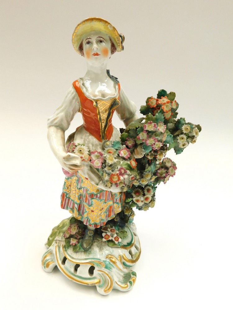 Bow figure of a lady flower seller, crack to foliage, minor chipping c.1765