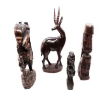 A collection of four East African tribal carved figures, hardwood and ebony.