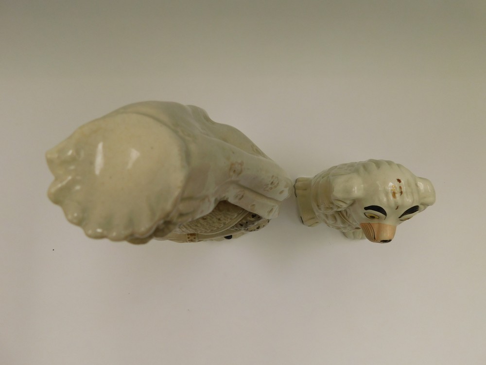 A Staffordshire figure of an early Victoria along with a Staffordshire dog, figure cracked - Image 2 of 2