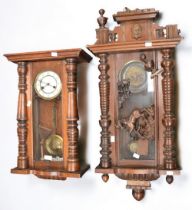 Two late 19th Century German mahogany wall clocks.