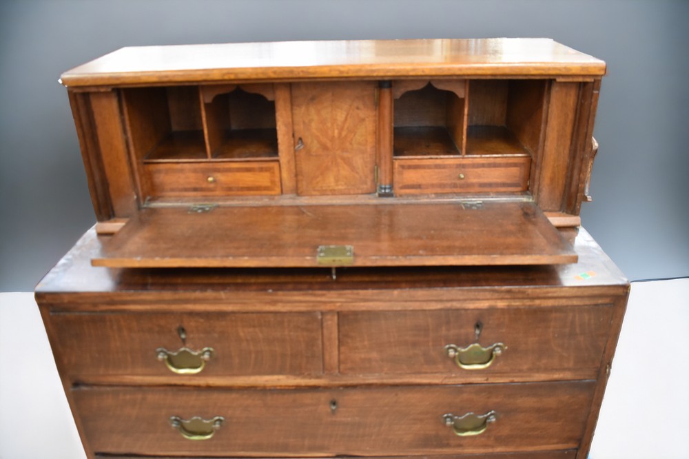A George III oak chest of two above three drawers with brass swing handles on bracket feet along - Image 3 of 3