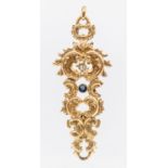 A Victorian sapphire and diamond drop gold pendant, comprising cuir roule gold motifs set to the