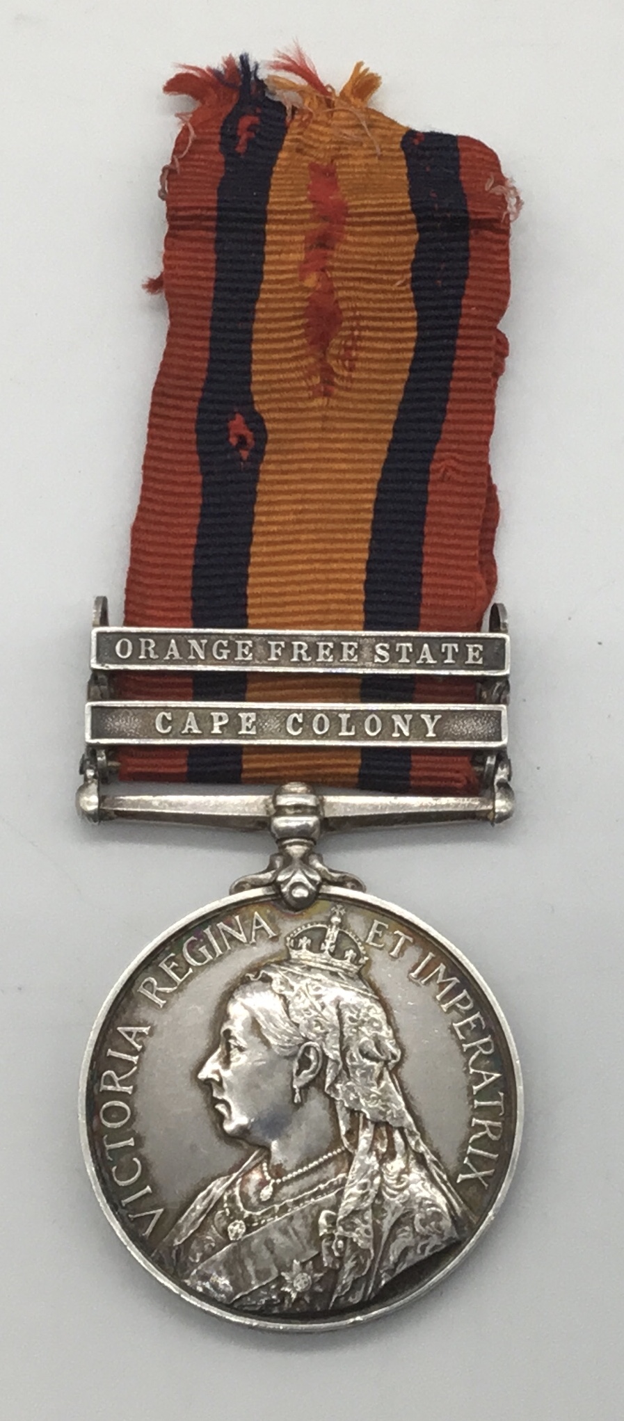 Queen’s South Africa Medal, with clasps for Orange Free State and Cape Colony. Awarded to 6063 Pte