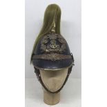 An early 20th century, Edwardian troopers helmet for the King’s Own Norfolk Imperial Yeomanry.