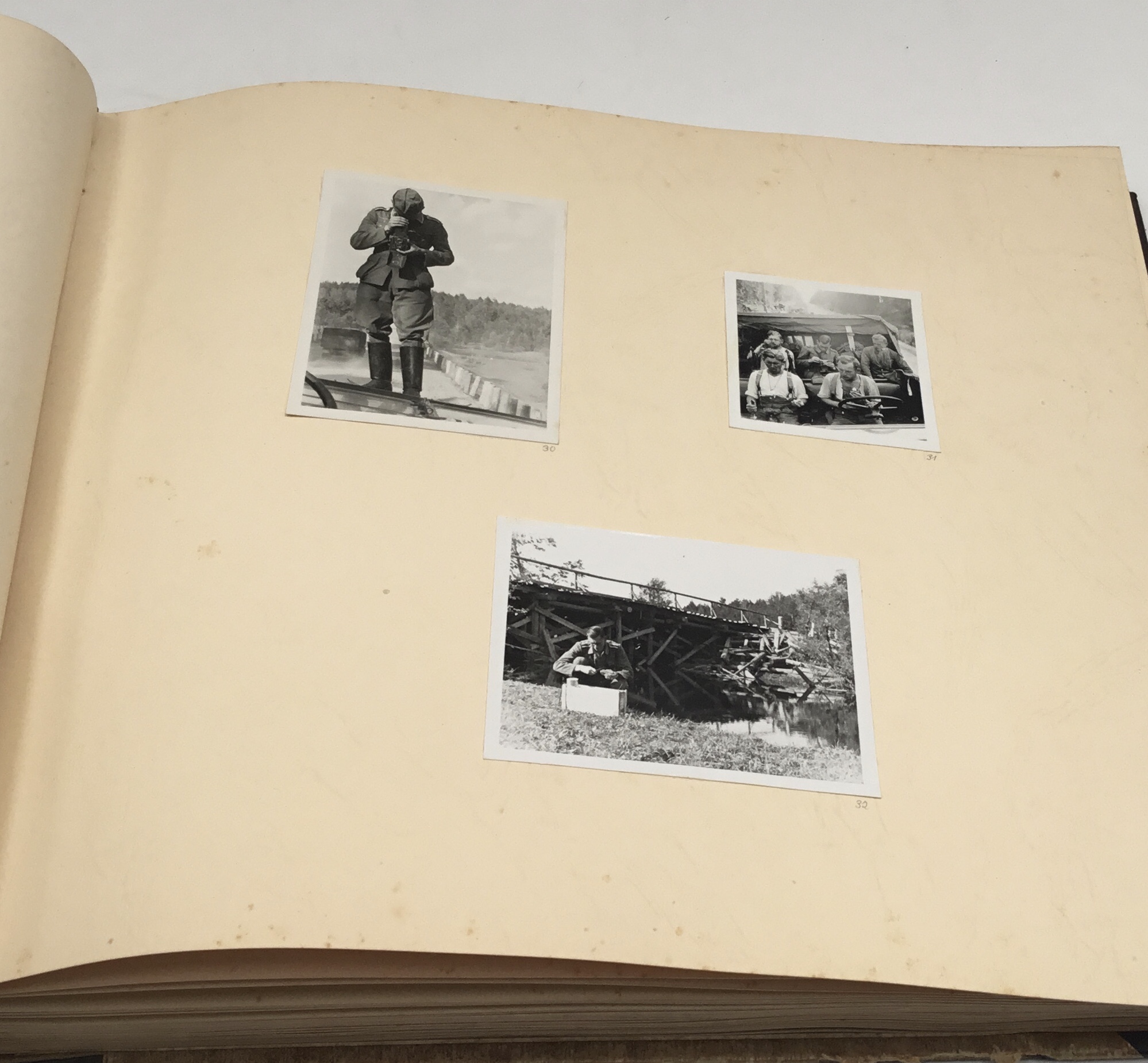 An interesting WW2 German photograph album, containing over 140 snapshot photographs taken by a - Image 8 of 10