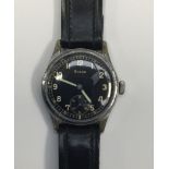 A WW2 era German Wehrmacht issued Grana wristwatch. Black dial with subsidiary dial, and luminescent