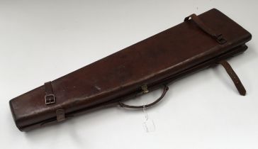 A very attractive antique English leather single shotgun travelling case “The Featherweight”