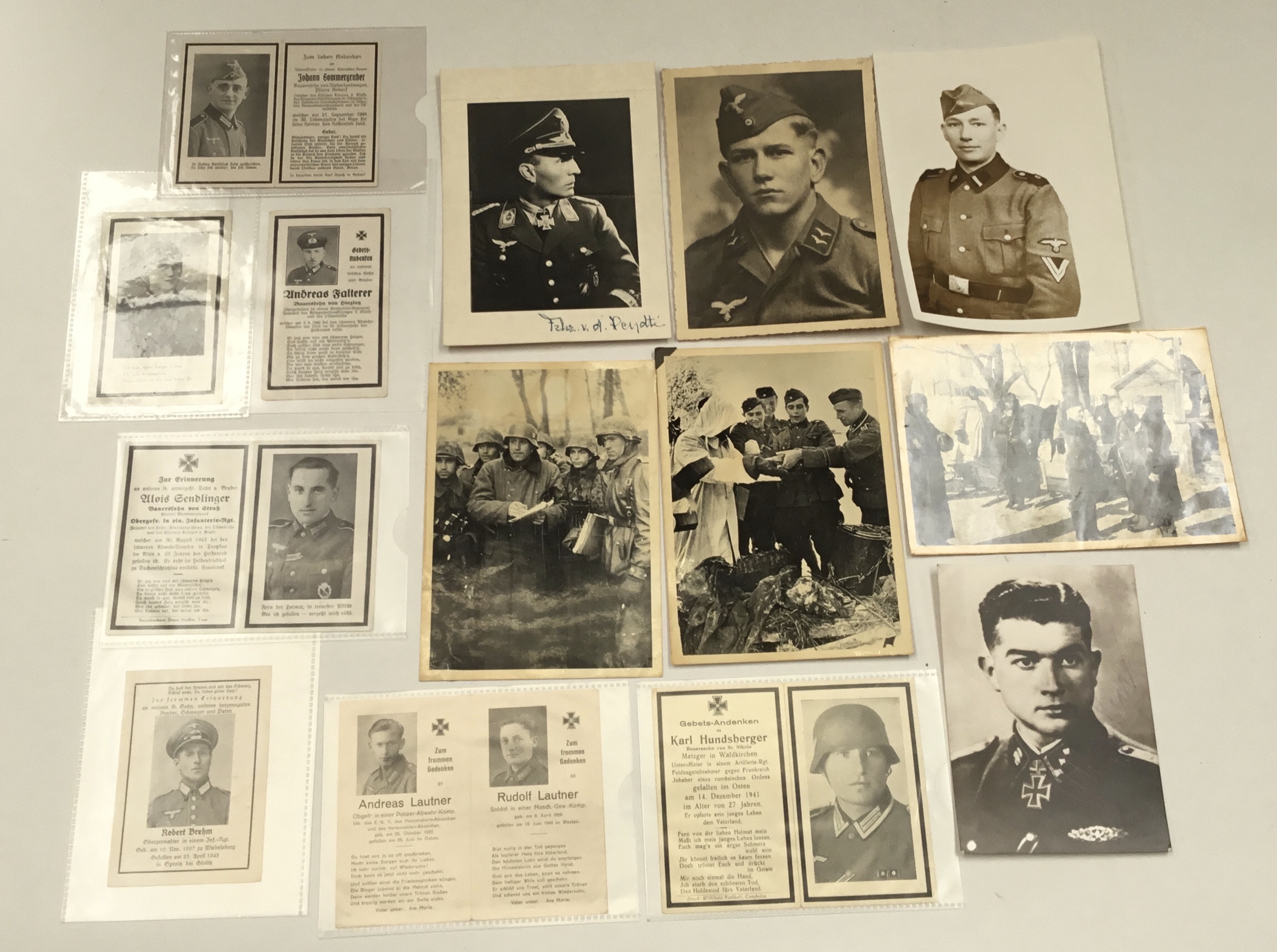 A quantity of WW2 German photographs, some signed, plus some German WW2 memorial death cards. To