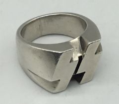 A silver WW2 style German SS rune ring. A well made and heavyweight piece, with a think shank, and