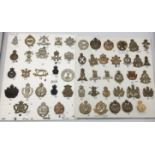 A good selection of vintage cap badges, for various regiments and corps. Including brass / gilding