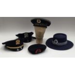 A selection of police and military headwear. To include: an Australian New South Wales Police bush