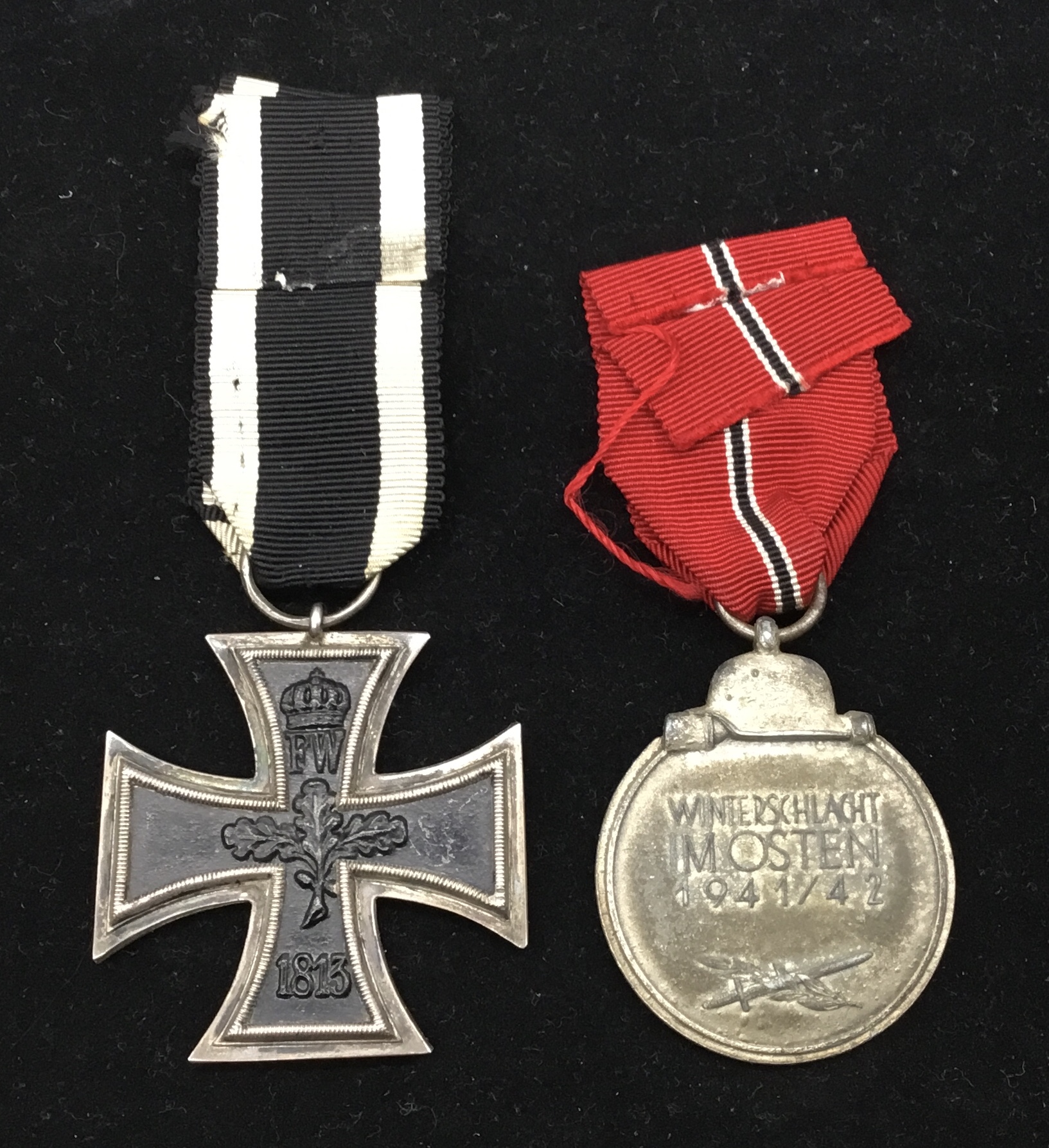 A WW1 German Iron Cross 2nd class, complete with original ribbon. Maker marked S.W to the suspension - Image 2 of 4