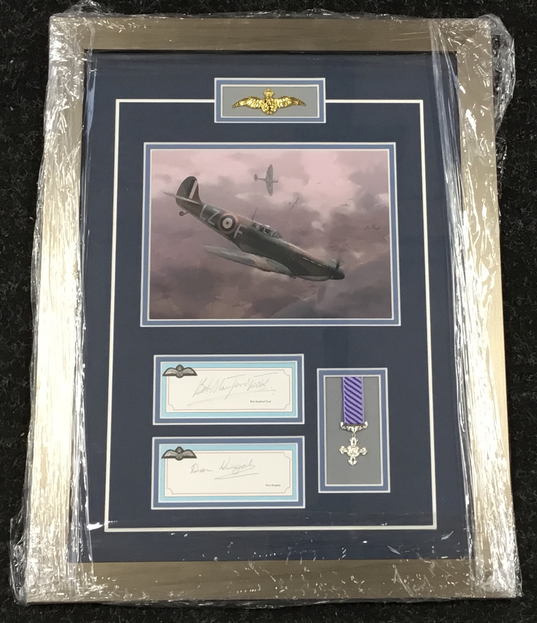 A good quality framed and glazed print of a WW2 Spitfire fighter aircraft, with facsimile