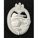 A WW2 German silver grade Panzer badge by Assault Hermann Aurich. Zinc with traces of a silver