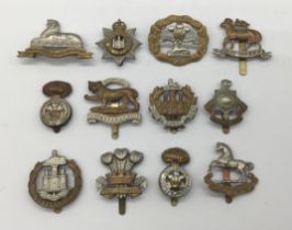 A  good selection of original circa WW1 era British regimental cap badges. All bi-metal designs,