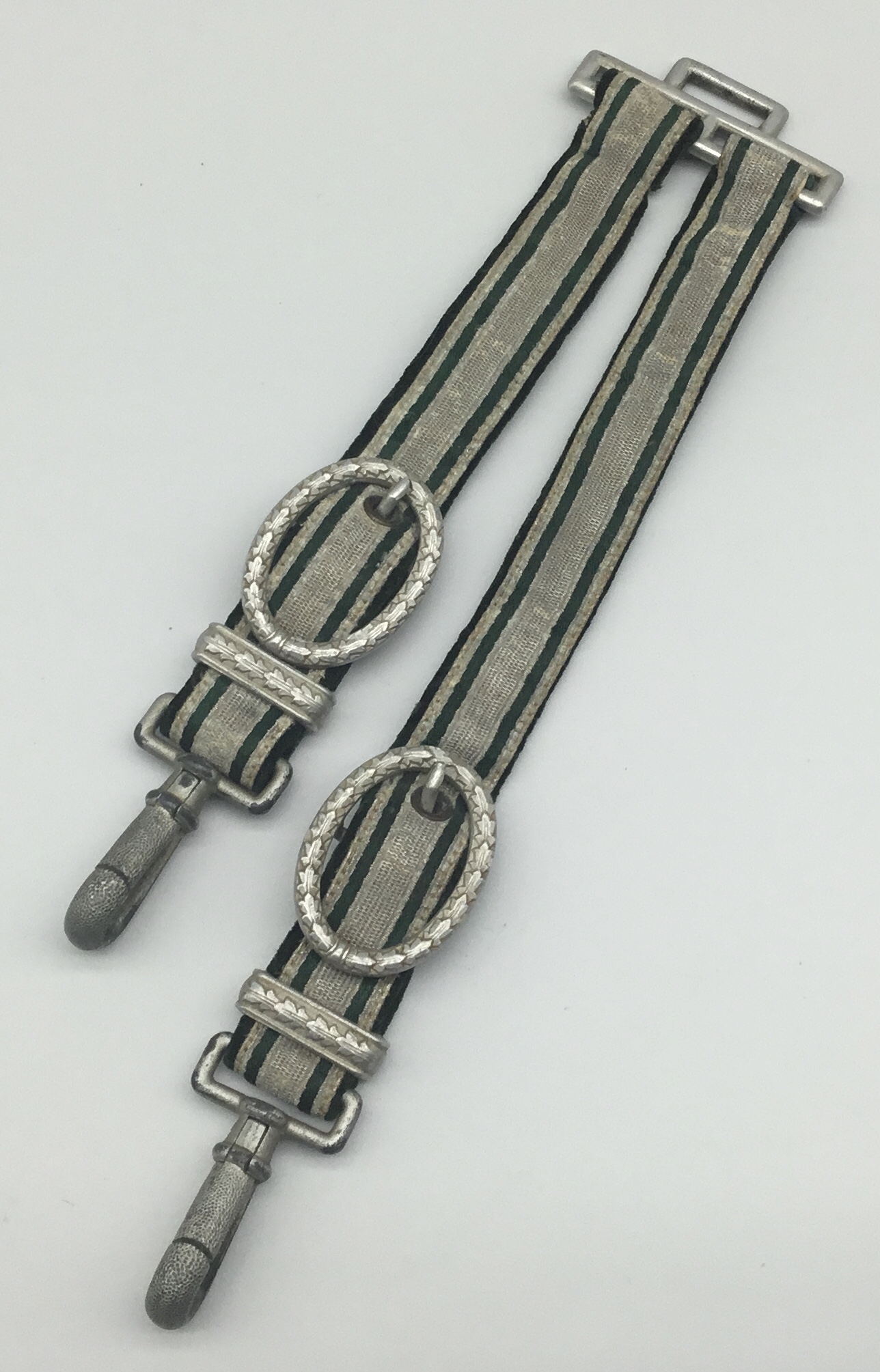 A nice set of WW2 era German Land Customs Dagger Straps. Aluminium alloy metal furnishings, with