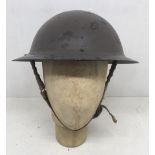 A WW2 Home Front / Home Guard MKII Brodie helmet. Raw edged variety, with stamped date of 1941,