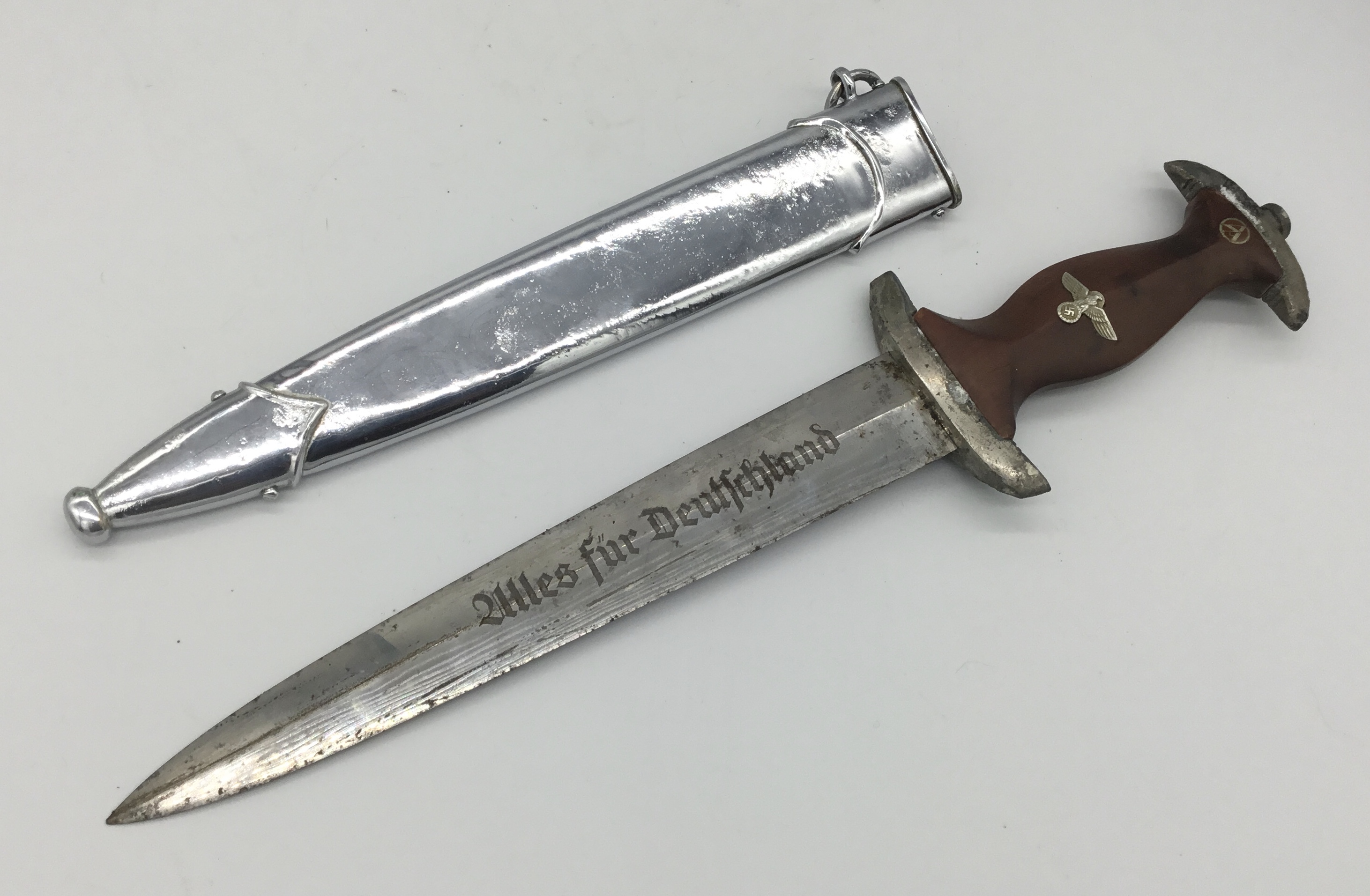 A WW2 era 1939 dated German SA dagger, with scabbard. Marked M7/94 at the ricasso for Gebrüder Bell.