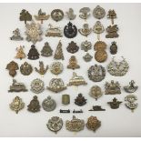 A large selection of circa WW2 British cap badges. Various English and Scottish regiments, including