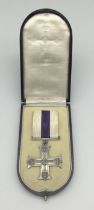 An original WW1 era Military Cross, complete with original fitted case. Unnamed as issued, with silk