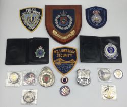 A selection of United States, British and other assorted countries police badges and medallions.