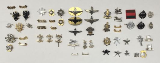 A large selection of mostly modern,  British military cap badges. Many with straybrite finish, a