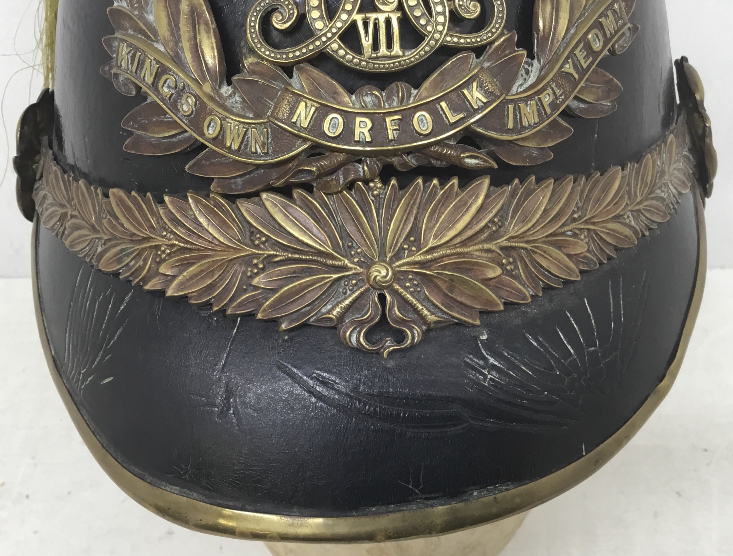 An early 20th century, Edwardian troopers helmet for the King’s Own Norfolk Imperial Yeomanry. - Image 7 of 12