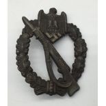 A WW2 era bronze grade German Infantry Assault Badge, by Josef Feix & Söhne. Standard design, with