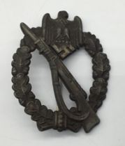 A WW2 era bronze grade German Infantry Assault Badge, by Josef Feix & Söhne. Standard design, with