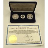 A 2005 issued Pearl Harbour .999 silver proof coin set, by Honolulu Mint, with fitted case and