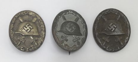 3 WW2 German Wound Badges, 2 in silver grade, and 1 in black. To include: a silver grade example