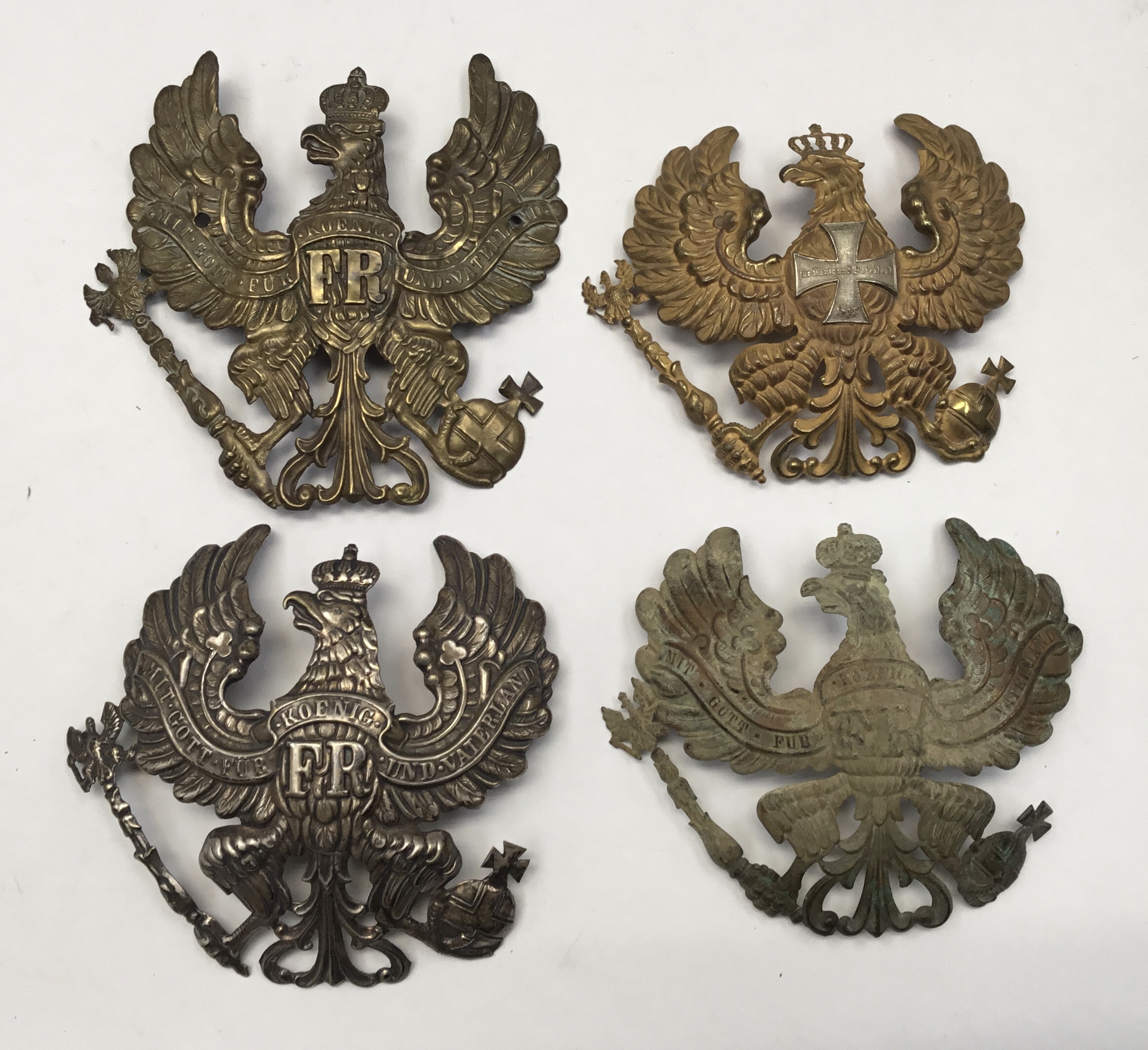 A selection of WW1 and earlier German pickelhaube spare parts. To include 4 helmet plates, one in - Image 2 of 5