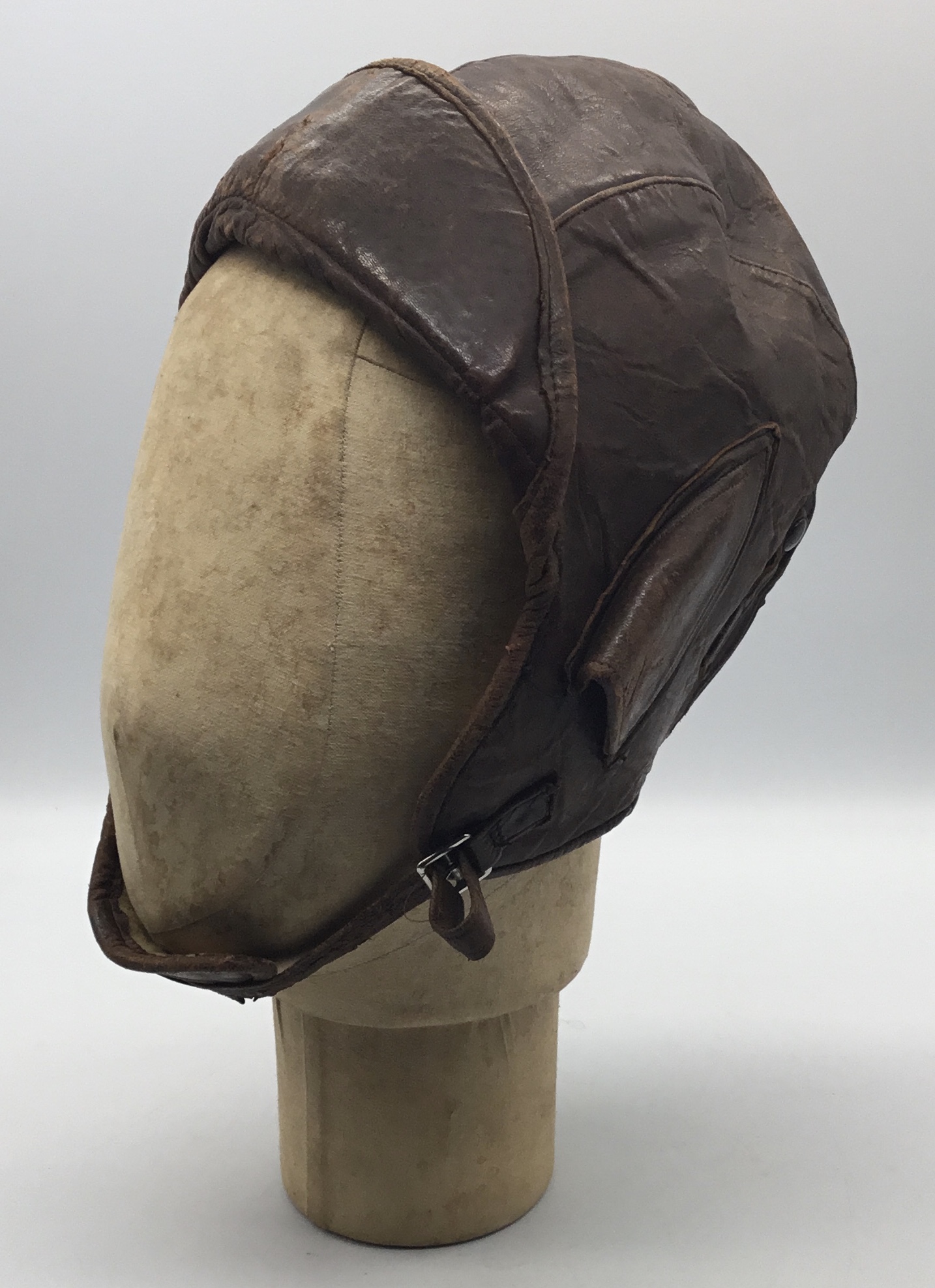 A Canadian made, leather flying hat, possibly WW1 or interwar era. With a soft and supple brown